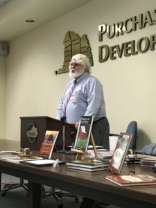 President Bill Mulligan presides over the business meeting on July 22, 2017